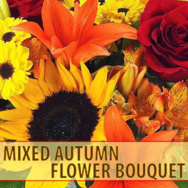Mixed bouquet with sunflowers, roses, lilies, and yellow daisies in autumn colors