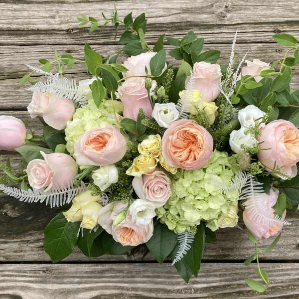 Blush and peach rose bouquet with pale green hydrangeas