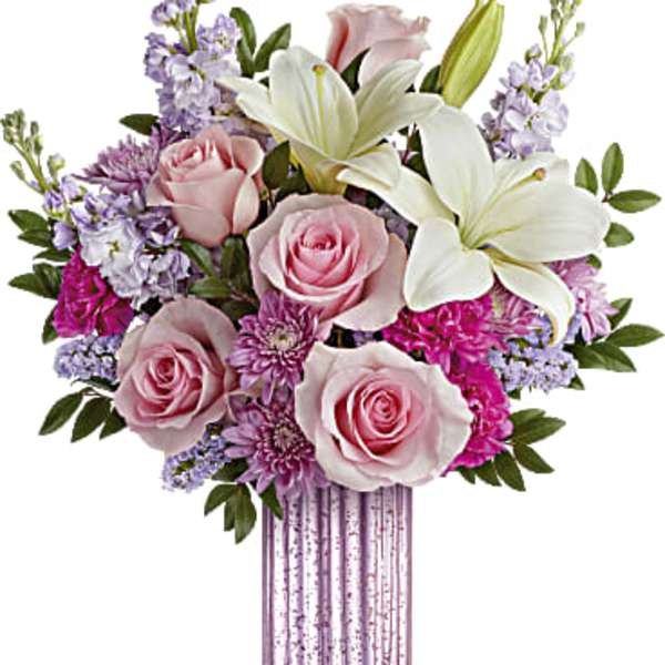 Pink roses and white lilies in a striped vase