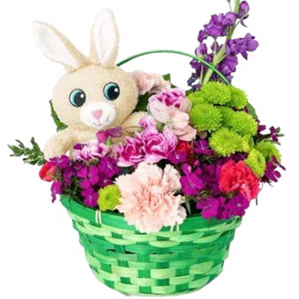 Plush bunny in a green basket with pink and purple flowers