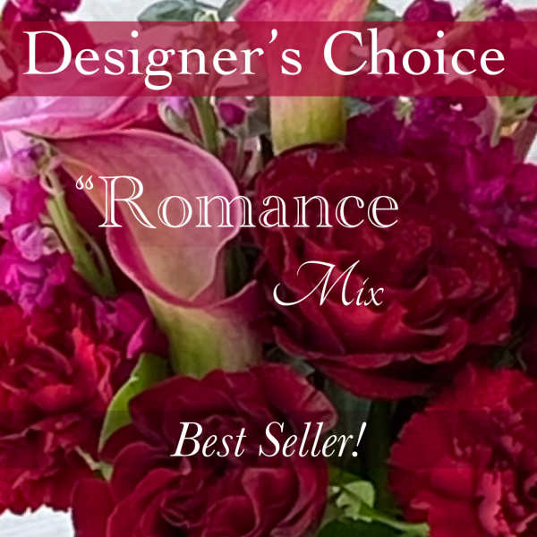 Pink and red roses with calla lilies and carnations