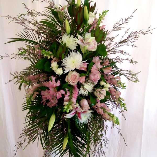 Tall floral standing spray with pink and white blooms