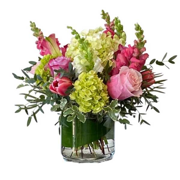 Pink and green mixed bouquet in a glass vase