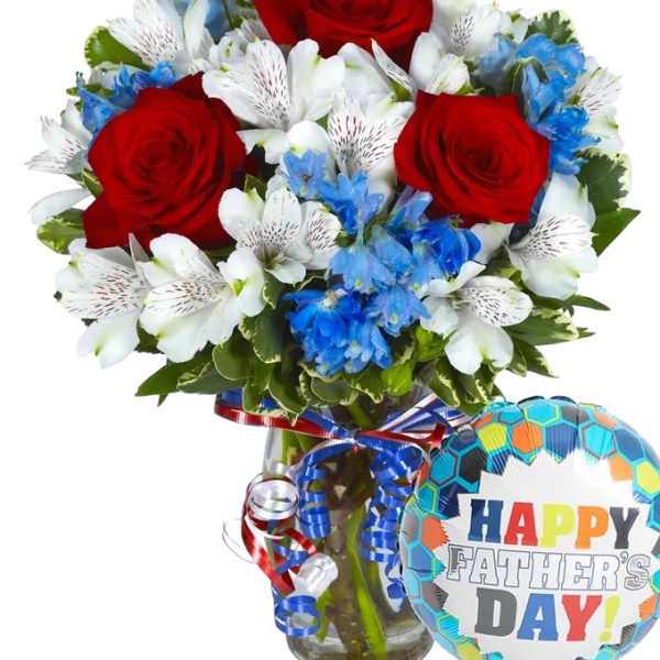 Bouquet of red roses, white alstroemeria, and blue flowers in a glass vase with a Father's Day balloon