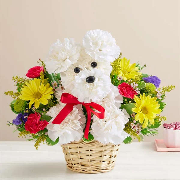 Flower basket arranged as a white teddy bear with a red ribbon