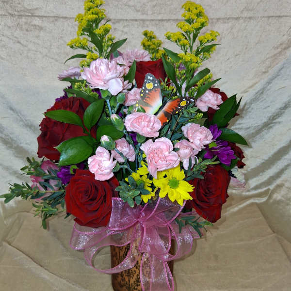 Beautiful red and pink arrangement with yellow flowers