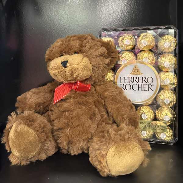 Teddy bear with a box of Ferrero Rocher chocolates
