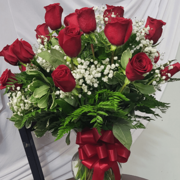 Classic two dozen red roses in vase