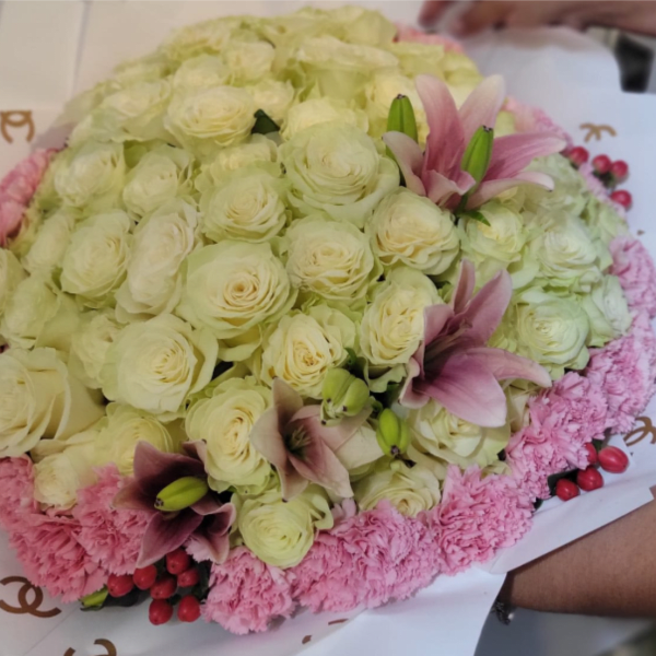 50 White roses with lily's and pink carnations