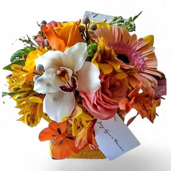 Mixed bouquet with orange, pink, white, and yellow flowers