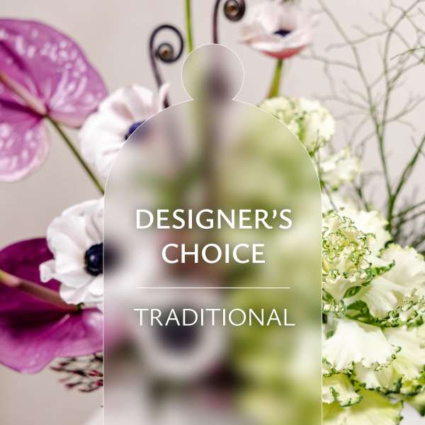 Designer’s choice traditional floral arrangement with white and purple blooms