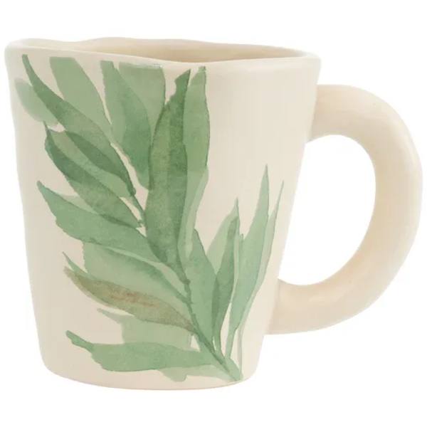 Cream ceramic mug with a green leaf pattern