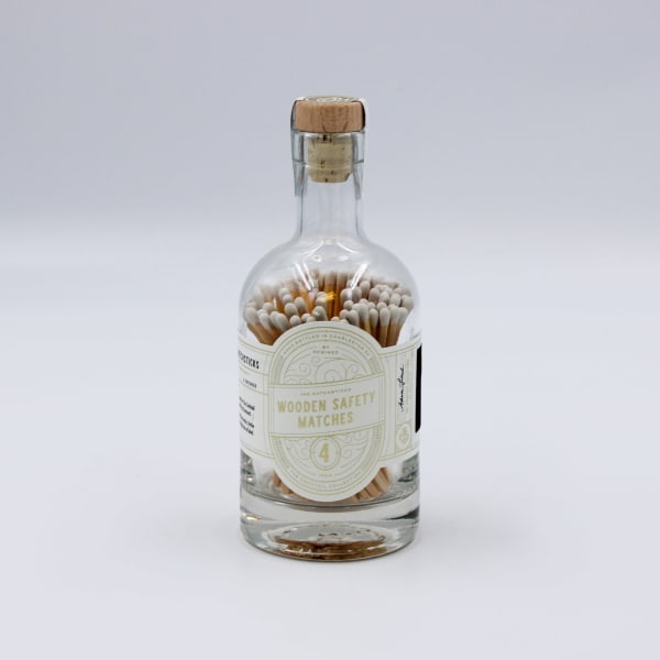 Glass bottle filled with wooden safety matches