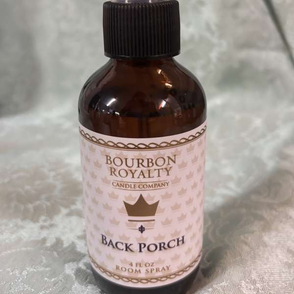 Amber room spray bottle labeled Bourbon Royalty Back Porch