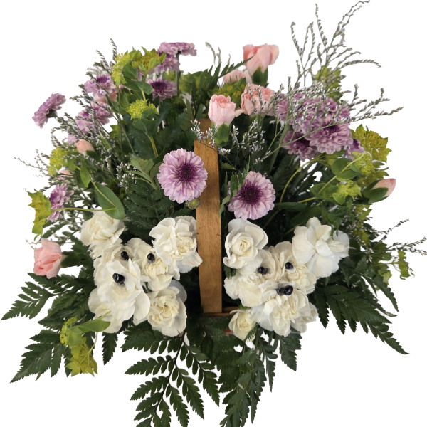Pink and white floral arrangement with purple blooms in a wooden easel frame