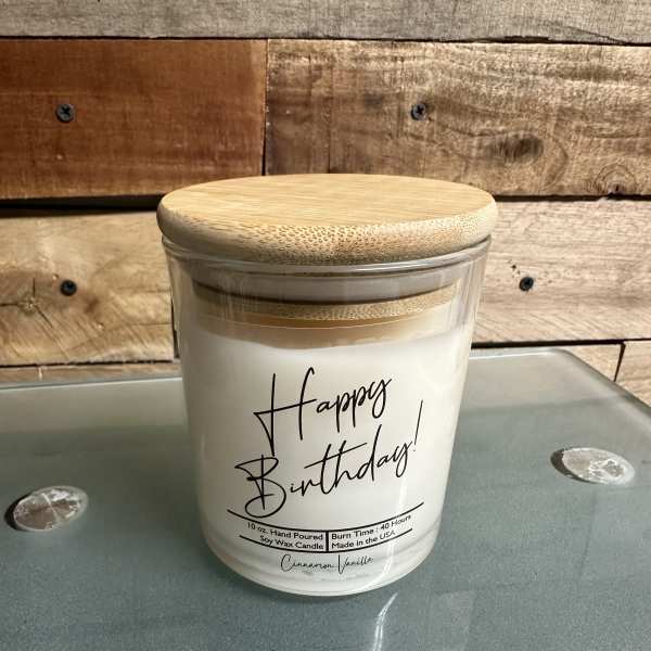 Birthday candle in a glass jar with a bamboo lid