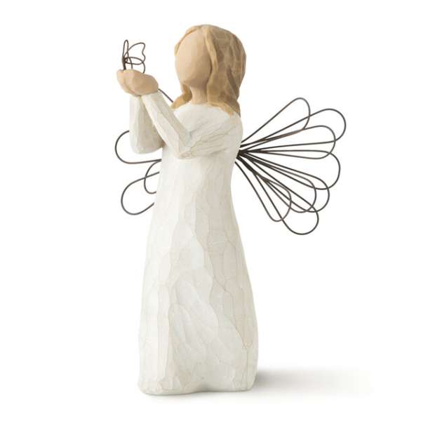 Small angel figurine in a white dress with wire wings