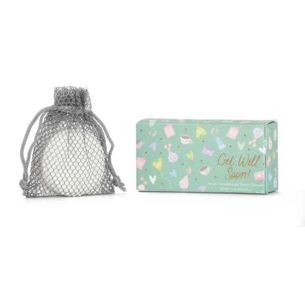 Mesh drawstring pouch beside a mint-green "Get Well Soon" gift box