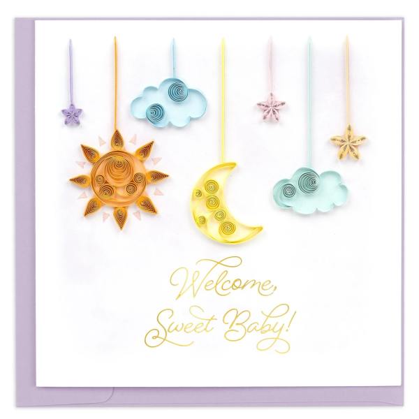 Baby shower card with hanging sun, moon, cloud, and star decorations