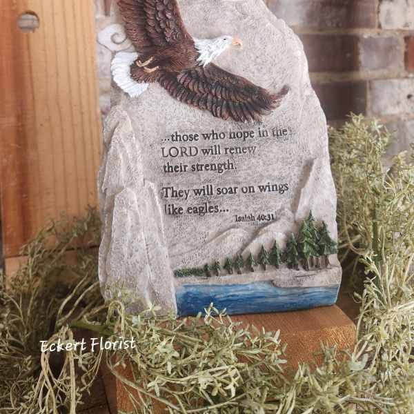 Decorative stone plaque with an eagle and Bible verse