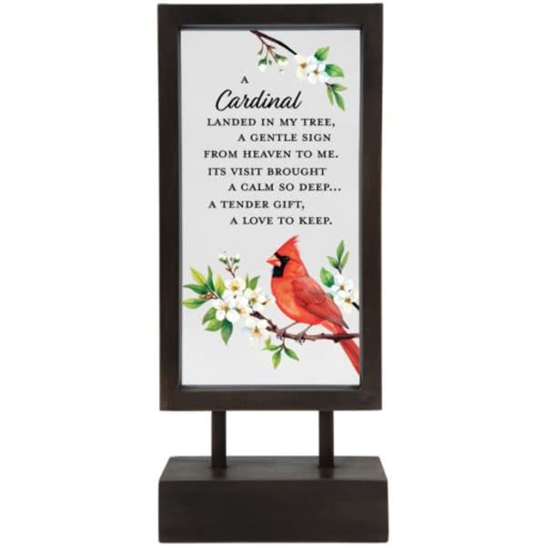 Framed sign with a cardinal illustration and floral accents on a stand