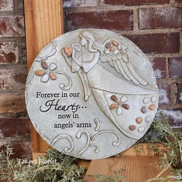Round memorial plaque with an angel and the words 'Forever in our Hearts'