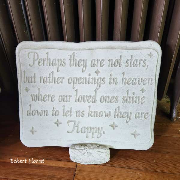White memorial plaque with an engraved sympathy quote on a stand