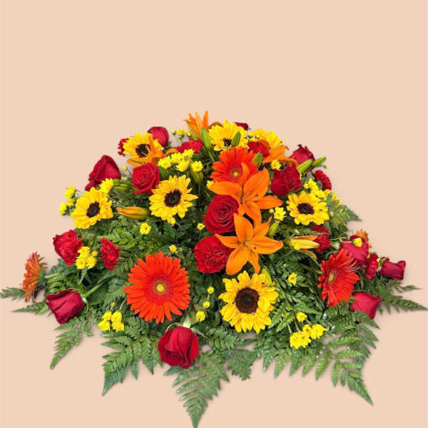 Bright mixed bouquet with red roses, orange lilies, and yellow daisies