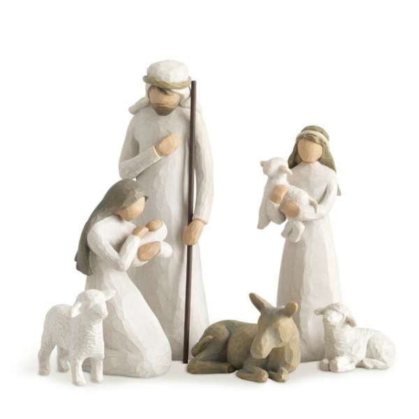 Nativity figurines of Mary, Joseph, baby Jesus, and sheep