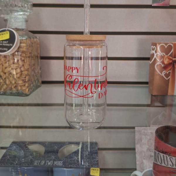 Clear tumbler with straw and "Happy Valentine" text