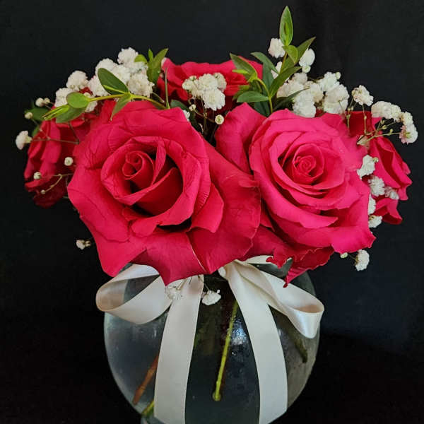 Small roses by the dozen (with greens and fillers)