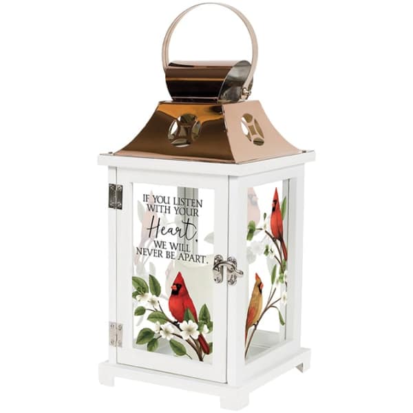 White memorial lantern with cardinal bird artwork and a quote on the glass