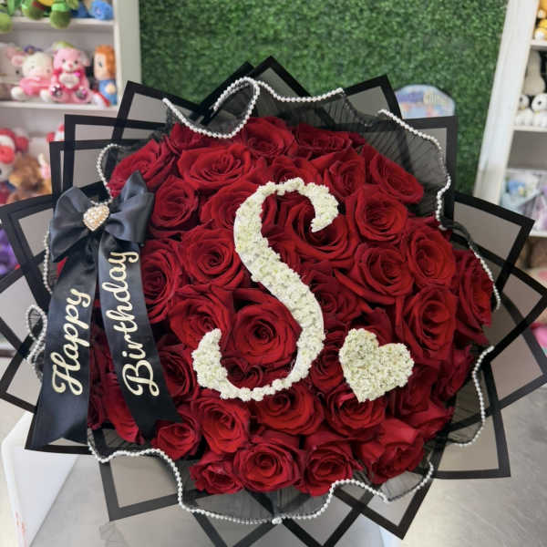 Red rose bouquet with a white floral number 3 and heart accent