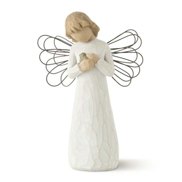 Decorative angel figurine holding a small bird