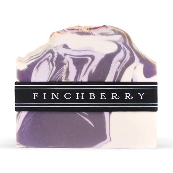 Marbled purple and white soap bar with a Finchberry label