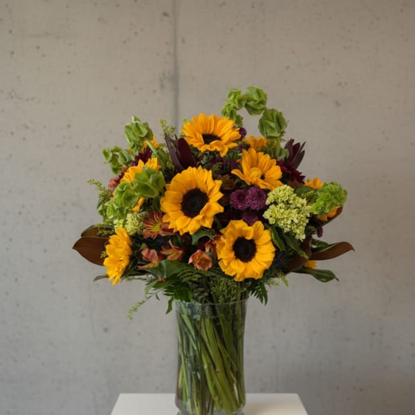 Sunflower bouquet in a clear glass vase