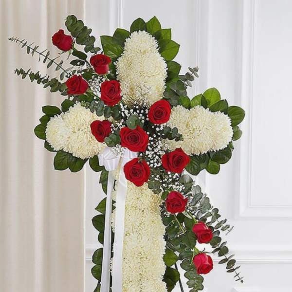 Standing floral cross with red roses and white chrysanthemums