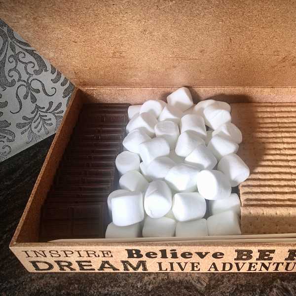 Box of marshmallows with chocolate bars and wafer cookies