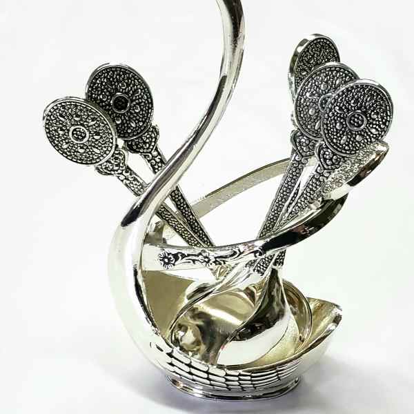 Decorative silver-toned metal swan-shaped basket with ornate handles