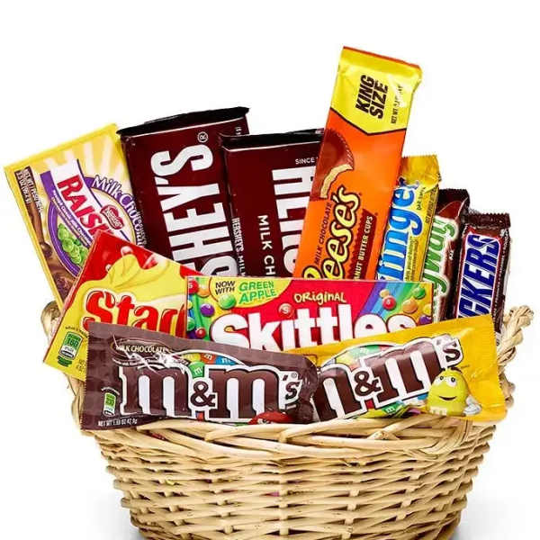 Basket filled with assorted candy bars and sweets