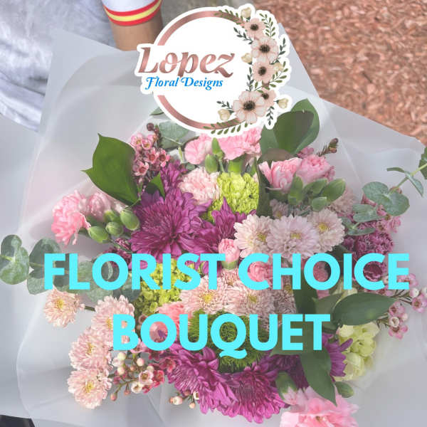 Mixed pink and purple bouquet wrapped in white paper