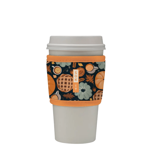 White takeaway coffee cup with a pumpkin-pattern sleeve
