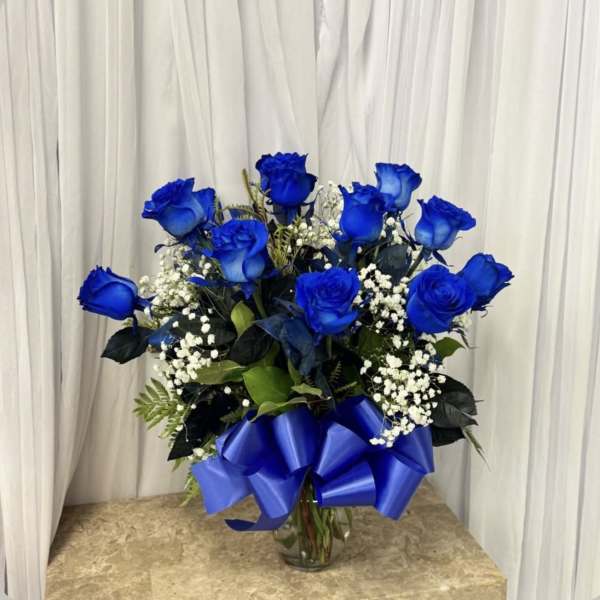12 blue roses for him!
