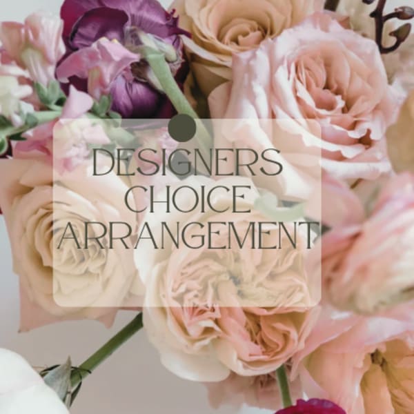Pastel bouquet of roses and mixed blooms with a designer's choice label