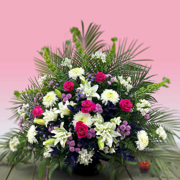 Large mixed bouquet with pink roses, white lilies, and chrysanthemums