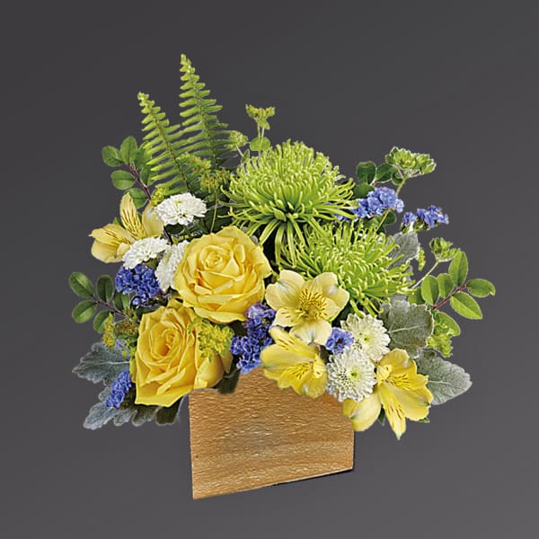 Yellow roses and green chrysanthemums in a gold vase