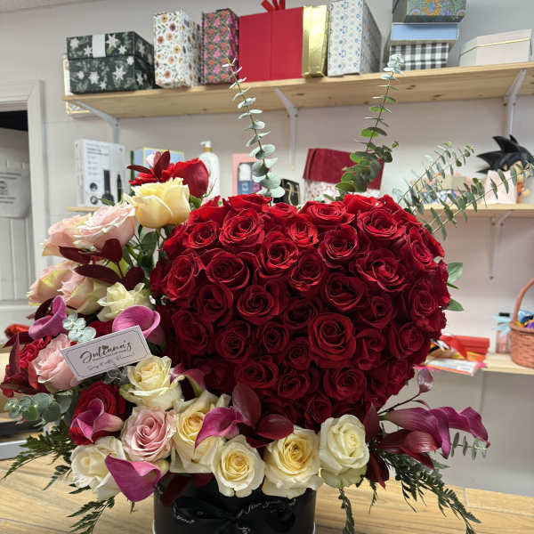 arrangements with small Heart-shaped mass of red roses