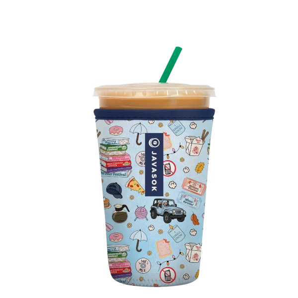 Insulated tumbler with a lid and straw in a patterned sleeve