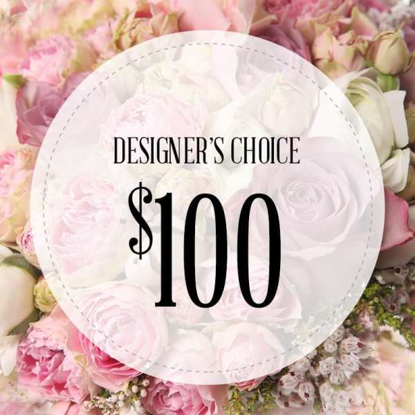 Pink and white rose bouquet with a $100 designer's choice label