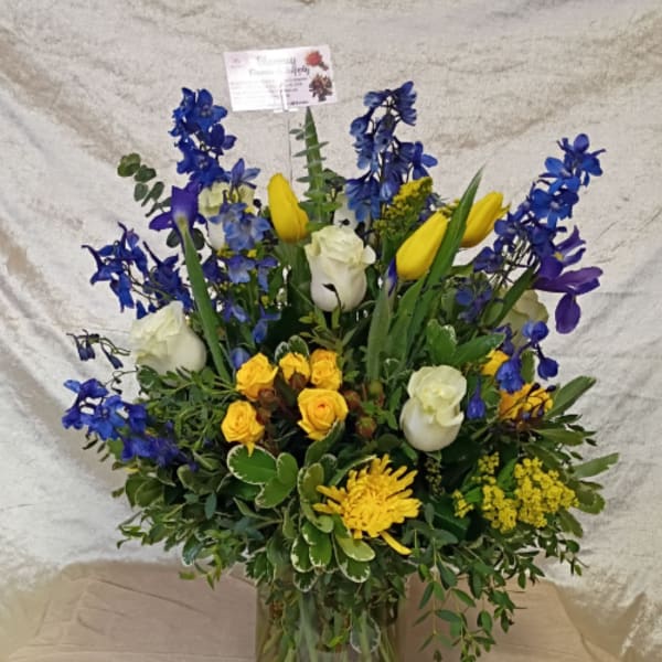 Elegant arrangement with roses and tulips